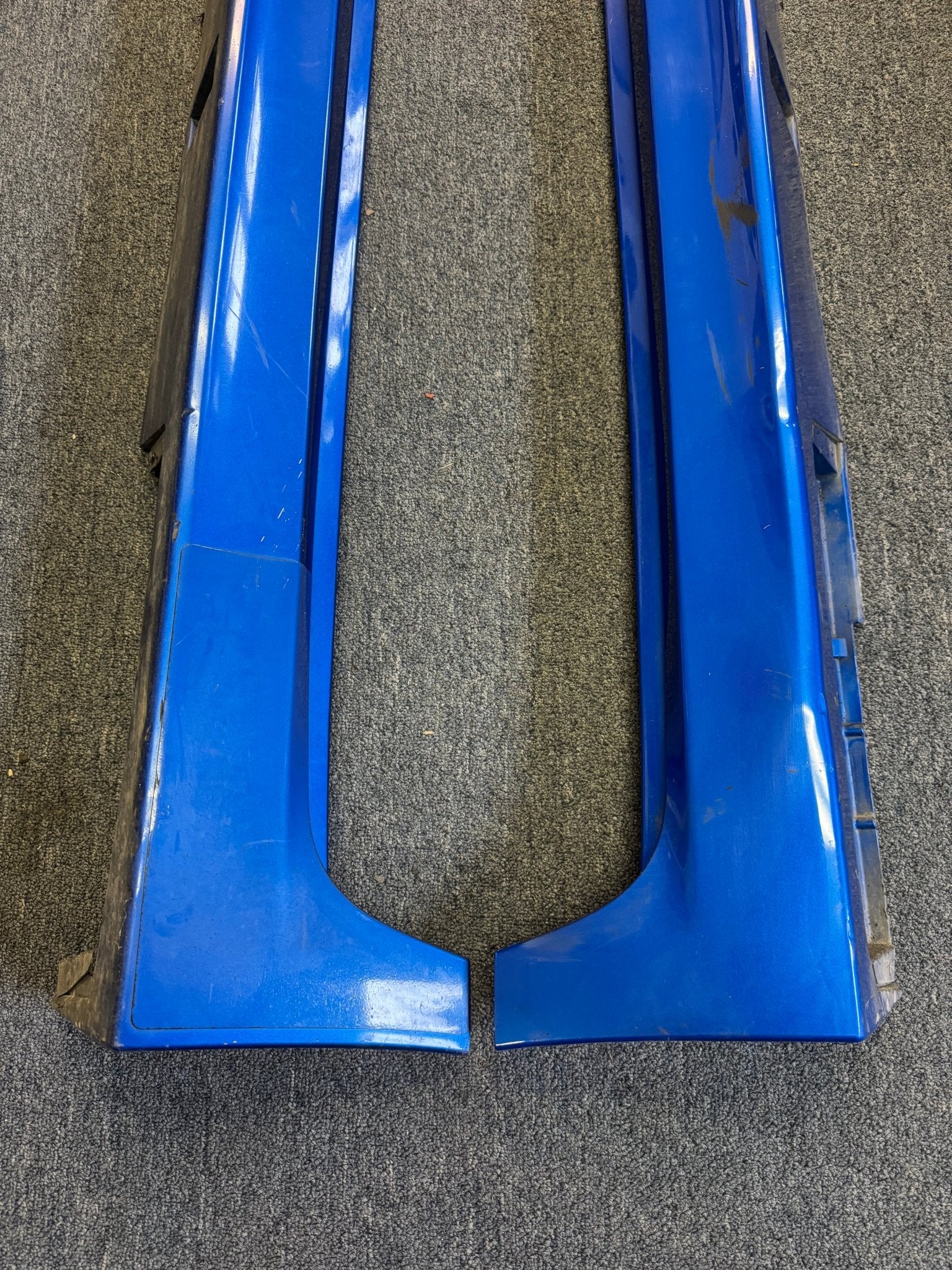 2008-2014 Subaru WRX STi WRB World Rally Blue OEM Side Skirts Pair (Strut Wall)