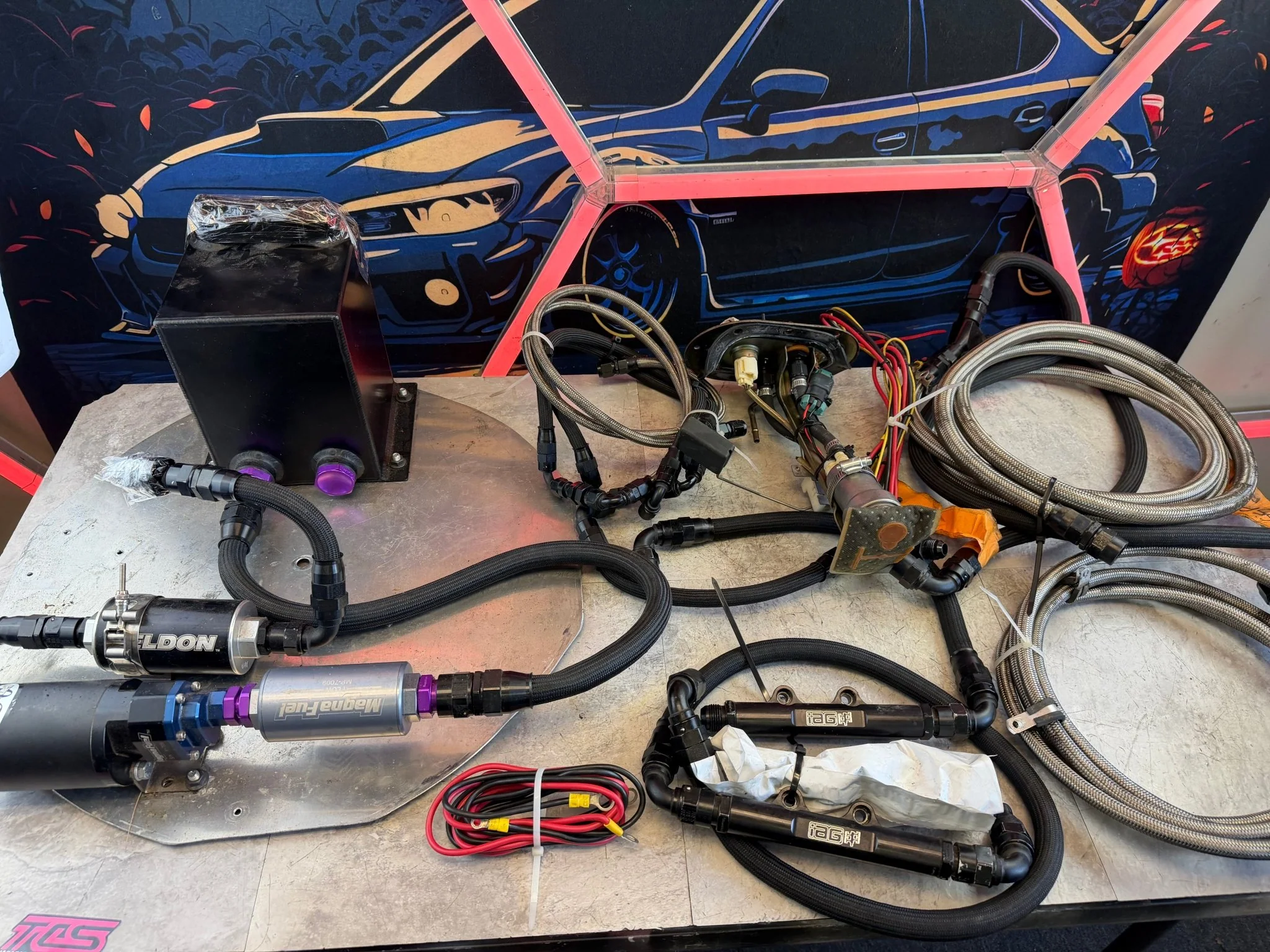 HUGE horsepower fuel kit front to back w/ electric inline 750 magnafuel pump , hellcat walbro 525 LPH feeder , surge tank , iag rails , lines , filters